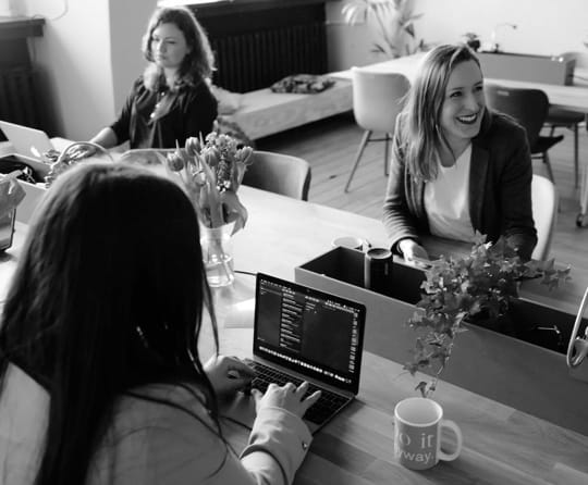 Three ladies working in the office